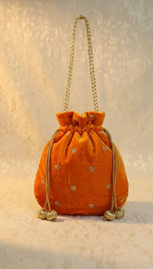 Orange velvet potli bag